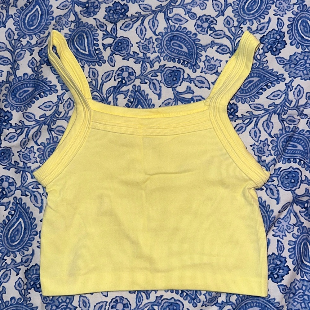 Urban Outfitters out from under Yellow tank
